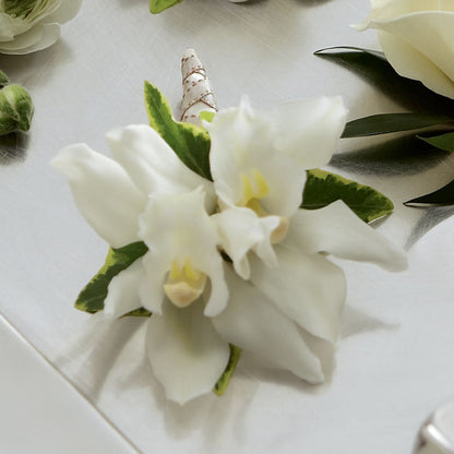 White Mini Cymbidium Boutonniere –  Flowers And Decor Same Day, Vero Beach FL